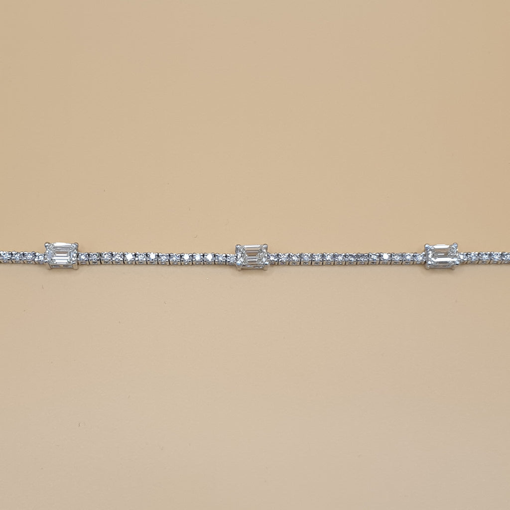 Tennis Bracelet – 18K White Gold with Emerald-cut Diamonds