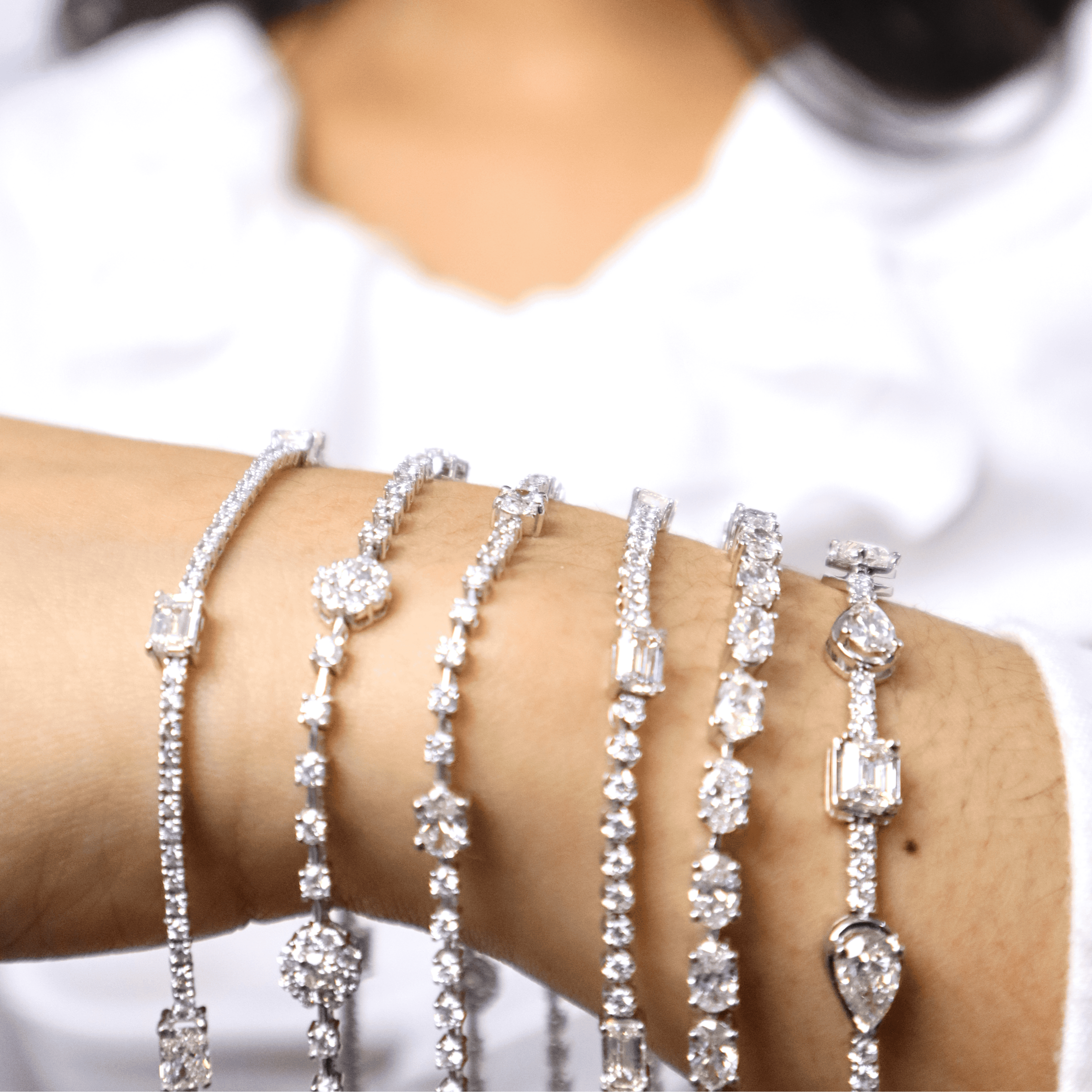 Tennis Bracelet – 18K White Gold with Emerald-cut Diamonds